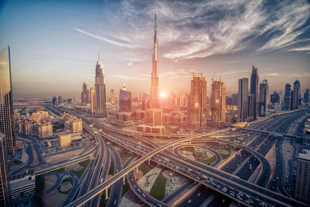 A beautiful sunset Dubai UAE with the busy streets of Dubai